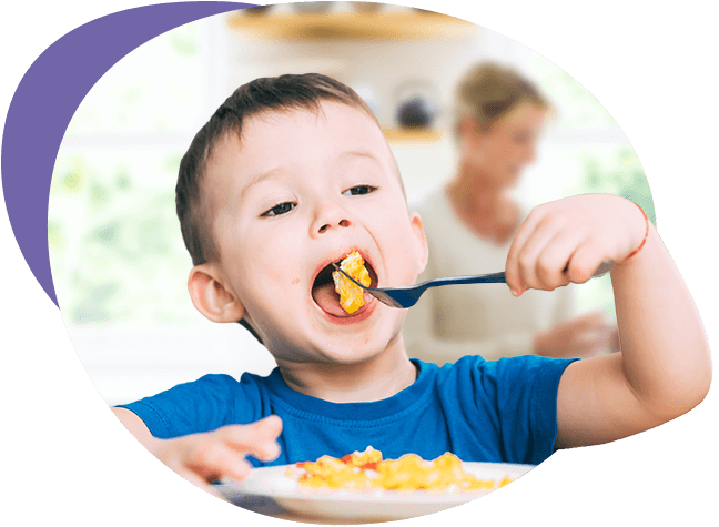 Boy eating scrambled quail eggs